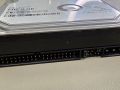 The wide 40-pin PATA connector and four-pin Molex power &ndash; an interface that has completely vanished from today's